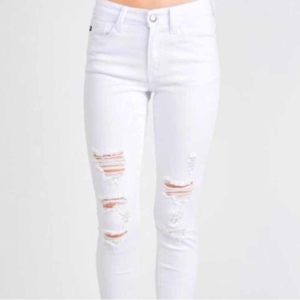 White janCan ripped skinny jeans